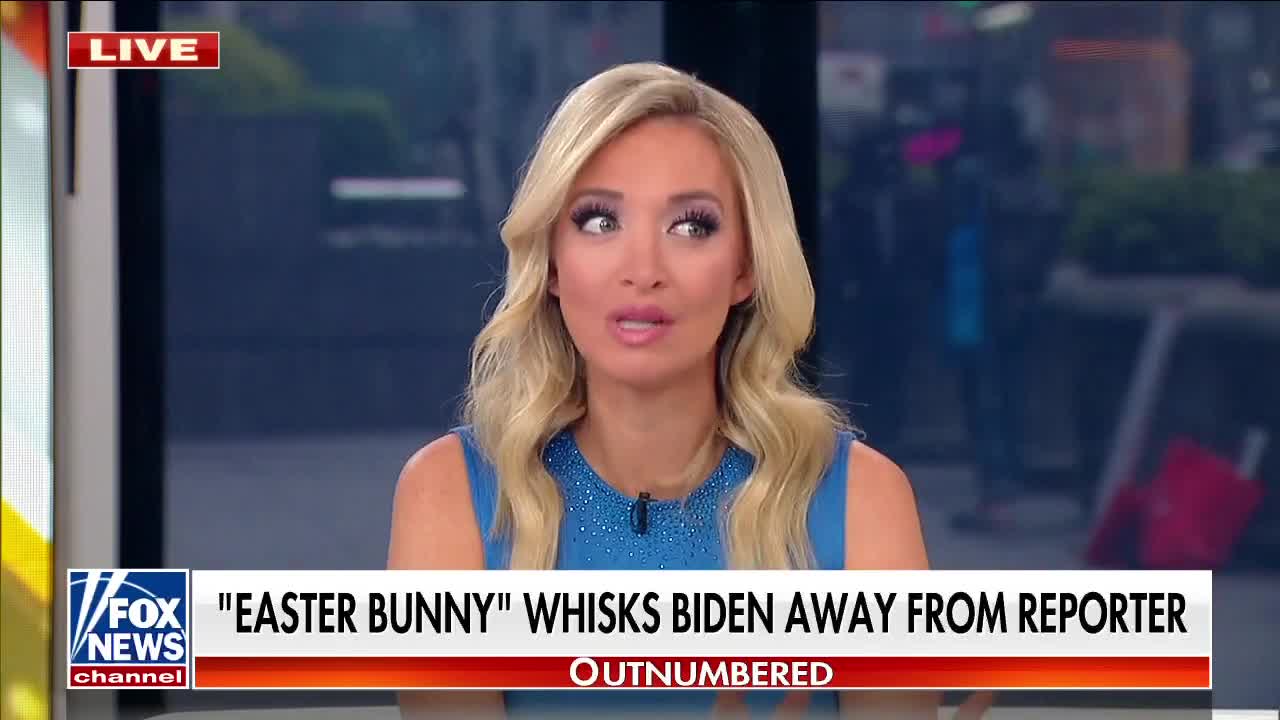 Biden whisked away by 'Easter bunny' while taking reporter questions