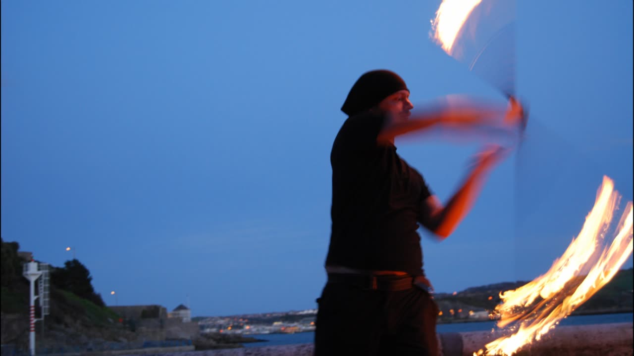 Fire Dancer Plymouth Hoe Atlantic Ocean City. 11th April 2015