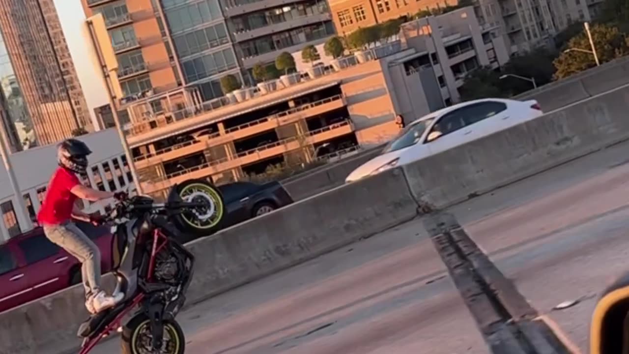 Motorcycle Wheelies In Downtown Dallas