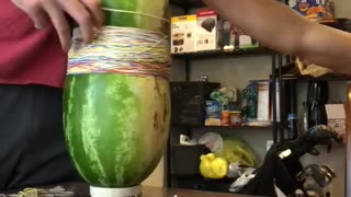 Watermelon explodes after rubber band science experiment