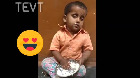 funny video. small baby eat funny video screen. try to not laugh challenge for you