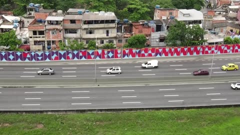 G20: Brazil erects colorful walls to hide favelas from leaders