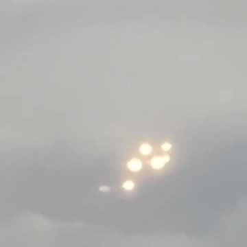 Strange lights seen from Plane window Dec 2024