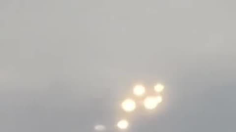 Strange lights seen from Plane window Dec 2024