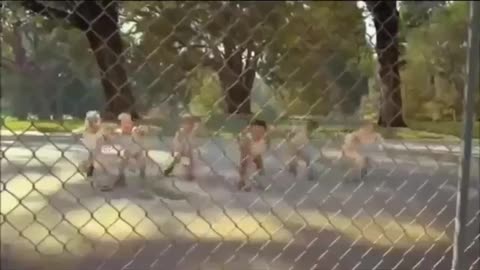 funny baby dancing on street