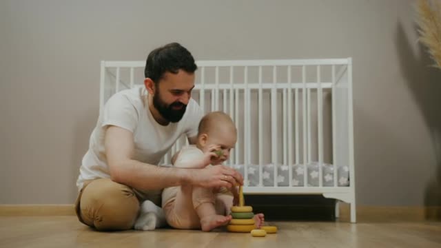 Kid gets super jealous when dad plays with baby cousin