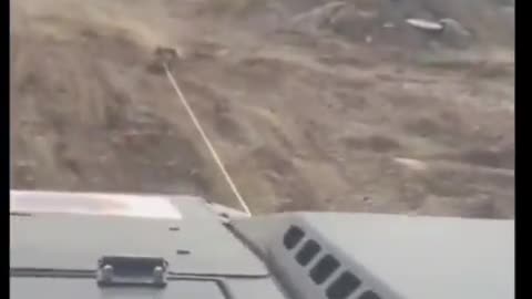 Israeli soldiers drag Palestinian body behind their vehicle