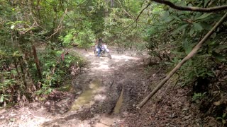 Deep mud on the trail DR350S