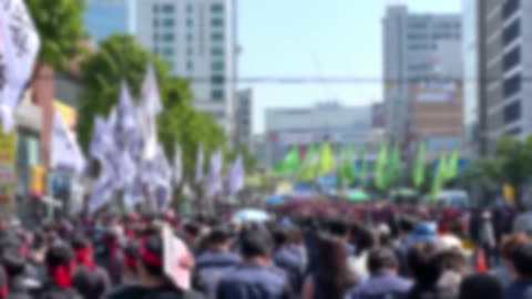 workers marching and demonstrating with flags