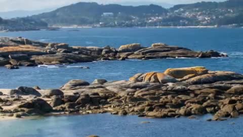 View of a beautiful beach full of rocks