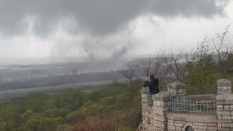 People Watch Tornado Touch Down Over Omaha Airport