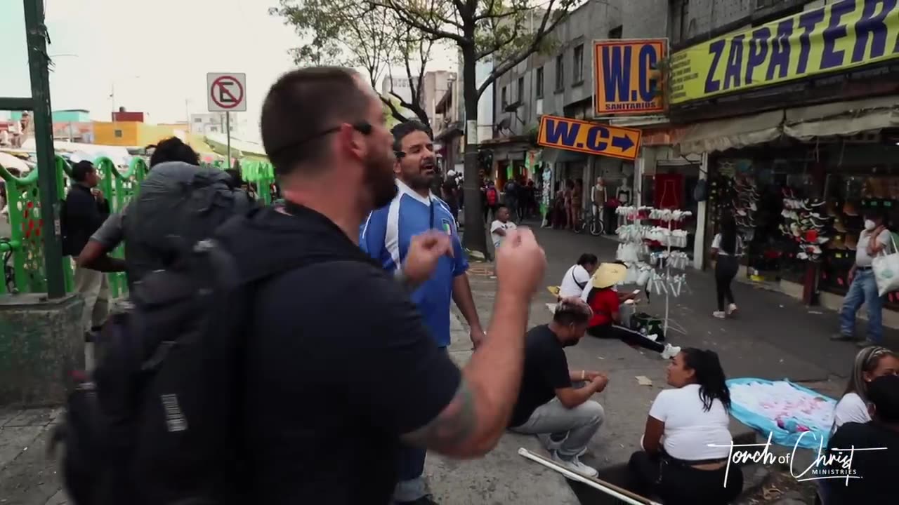 Preaching to prositutes and street vendors near Mercado Sonora, Mexico City _ Ph