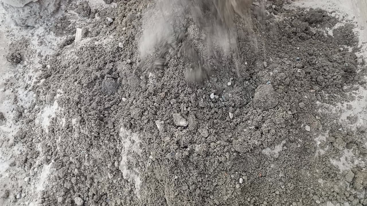 charcoal powder and sand cement mixing in water