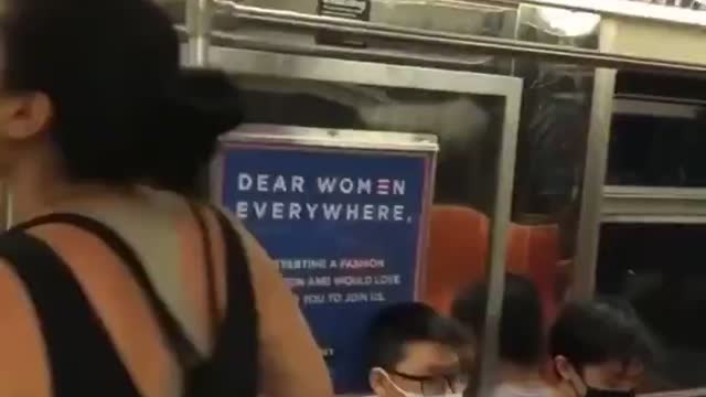 MORE OF THIS!! Asian woman rips propaganda of the subway. (part 2)