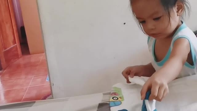 2yr. Old girl folding her own clothes 🥰