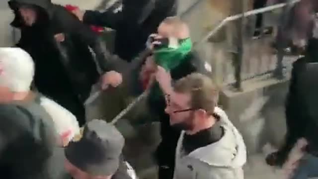 Metropolitan police running away from Hungary supporters at Wembley stadium