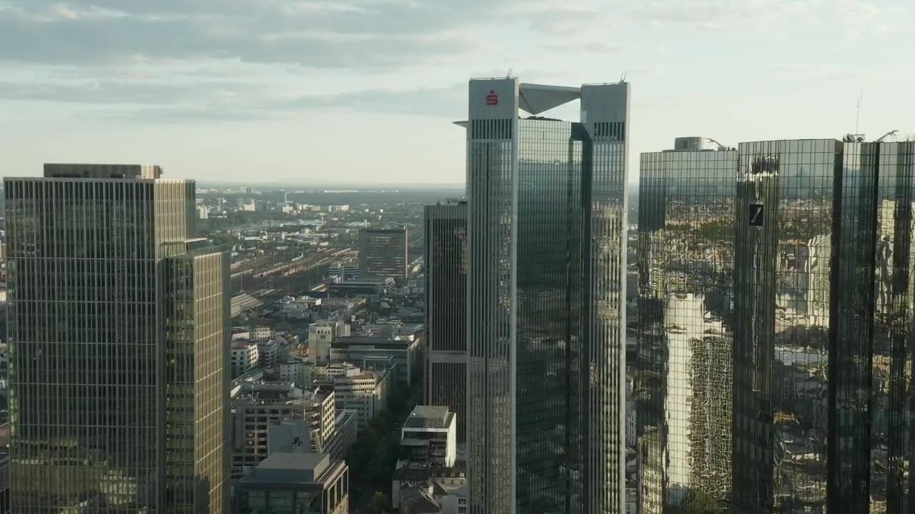 Flying over a big city near skyscrapers