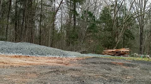 Leveling piles of gravel in driveway part2