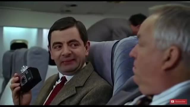 Mr. Bean Takes Photos On The Plane (clip)