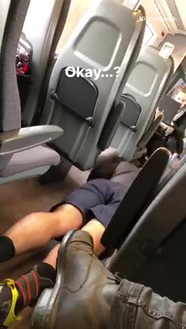 Man in work out clothes does push ups on train