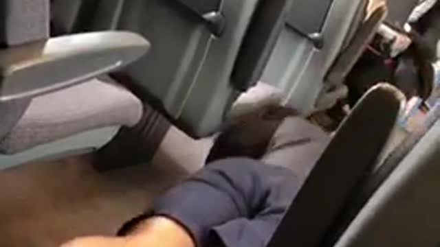 Man in work out clothes does push ups on train