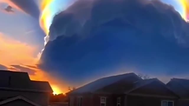 Rainbow colored scarf cloud over Haikou city in China