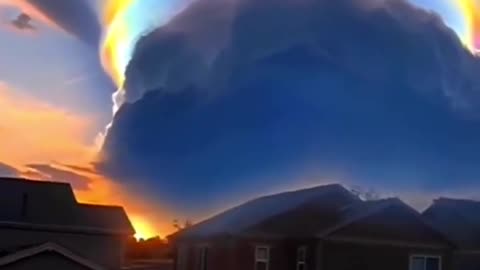 Rainbow colored scarf cloud over Haikou city in China