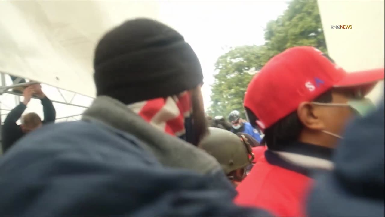 Everywhere Man #RedonRedGlasses Arguing with Police at Capitol near Risers