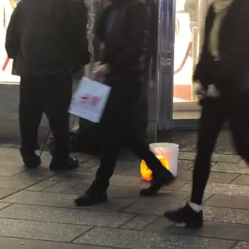 Guy dressed as a monster in cape dances in the mirror to boombox song