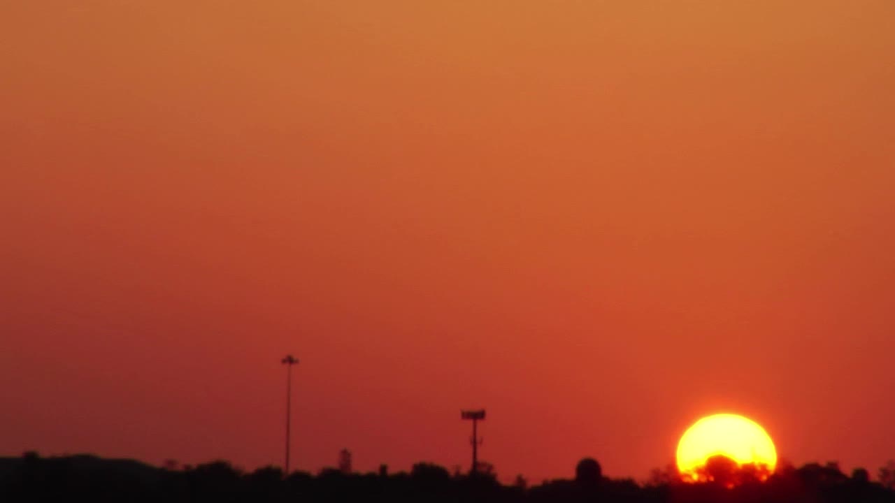 Airplane fly in evening .