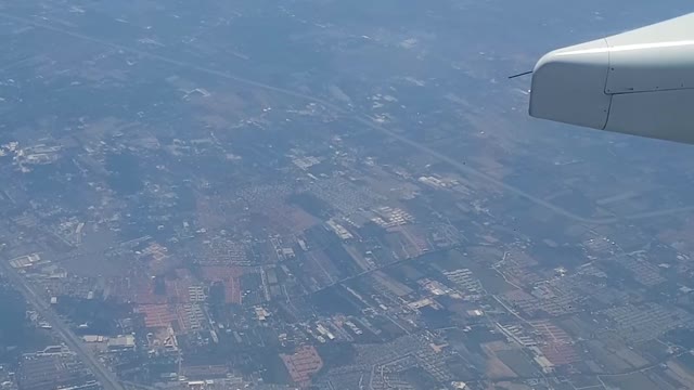 View of Bangkok City from an Airplane Window