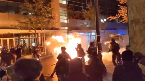 BLM Attempt to Burn Police Officers with fire Bomb.