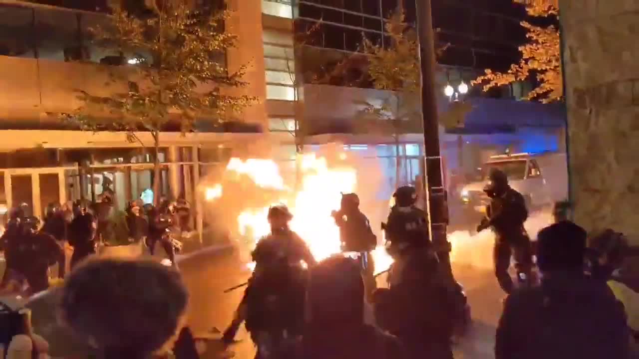 BLM Attempt to Burn Police Officers with fire Bomb.