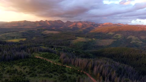 Sunset drone over Rocky Mountains