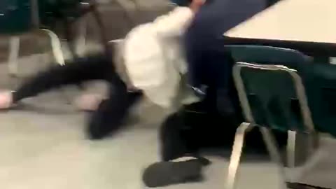 Two high school girls went into a big fight.