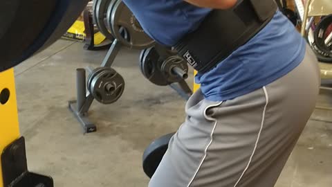 Teaching my friend to low bar squat