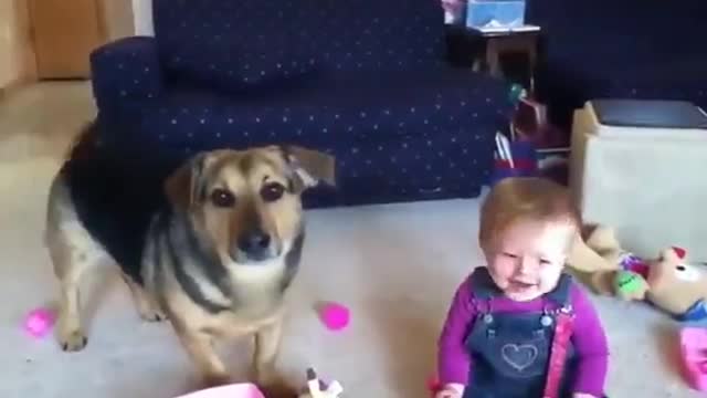 ADORABLE BABY PLAYING HER DOG OF BUBBLES