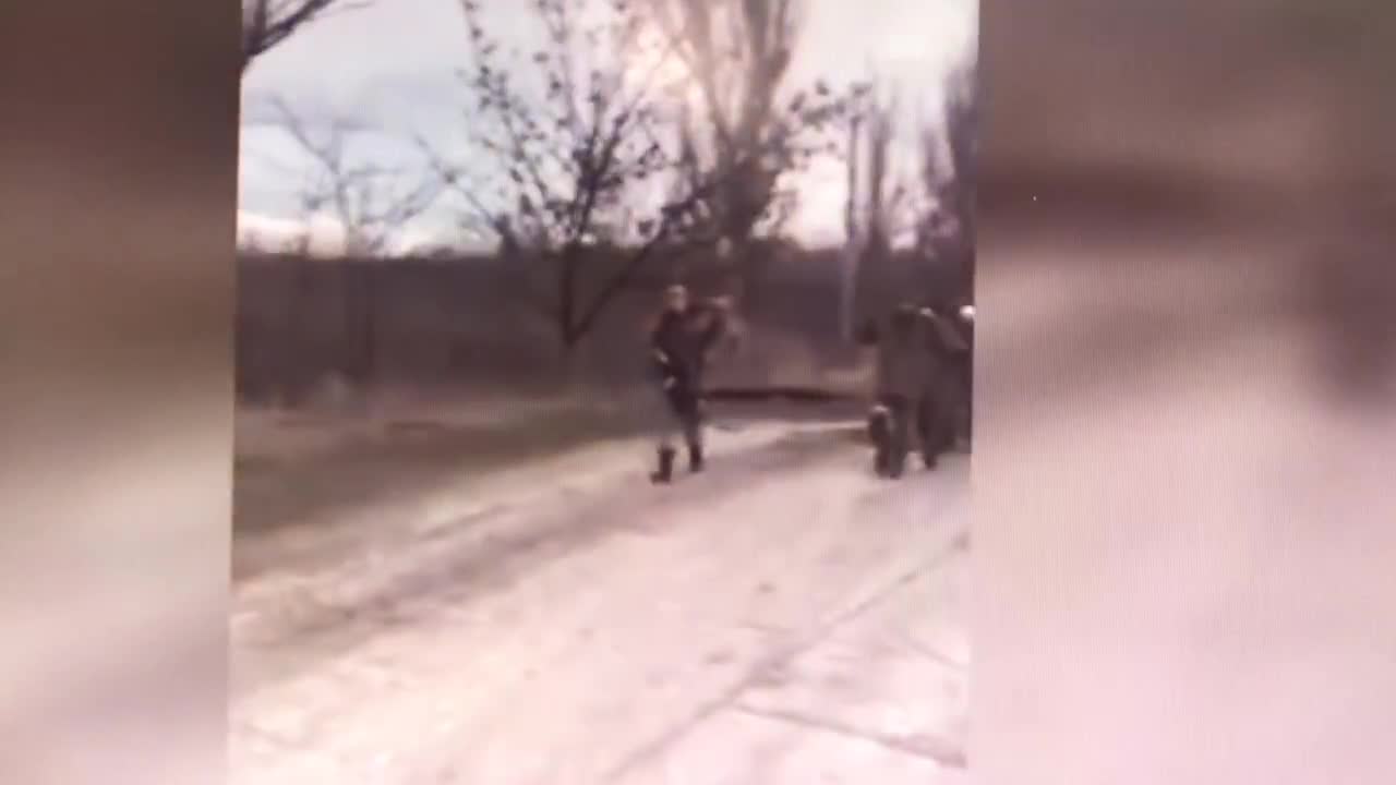 A line of Russian soldiers surrendering in Ukraine