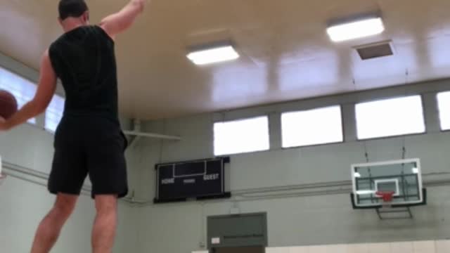 Amazing balance basketball trick shot