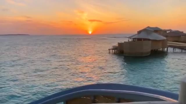 Maldives by the sea with sunset Great view .