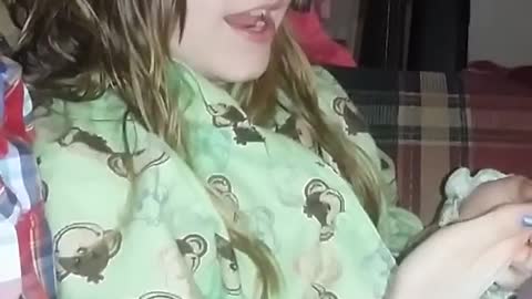 Little Girl Imitating Her Mom