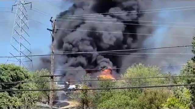 Teen hitting a flaming tennis ball causing a massive fire, power outage in California town