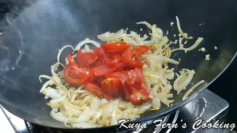 Add The Tomatoes And Continue Fry