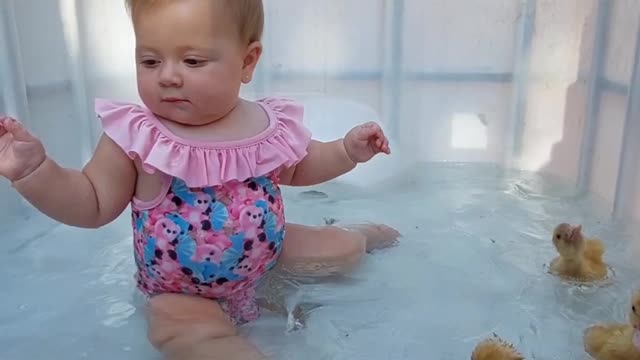 Baby and duck