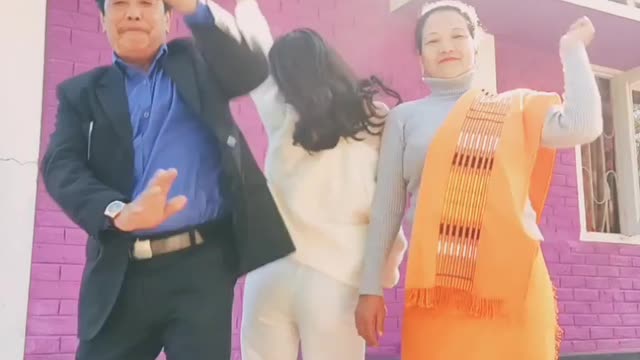 Dad,Mom and Daughter dancing happily