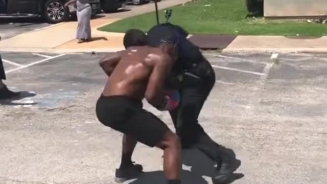 the cop in a boxing street fight