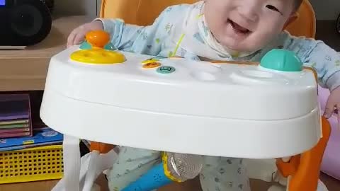 This is a cute smiling baby video.