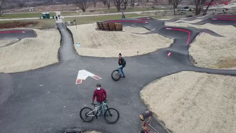 Unicycle riding in a pump track drone footage