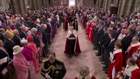 Coronation ceremony King Charles III and Queen Camilla enter Westminster Abbey - BBC News