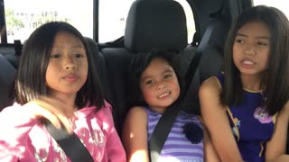 Girls singing along with the song Splish Splash